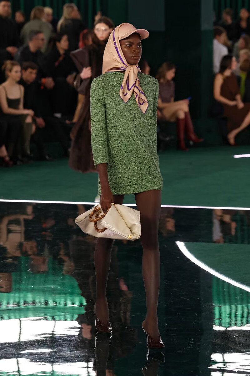 Milan Fashion Week 2025 scarves draped over baseball caps FallWinter